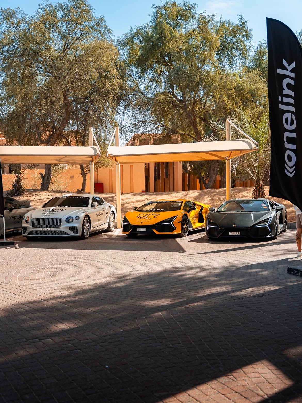 Base camp: the fleet parked up at the resort under the Onelink banner.
